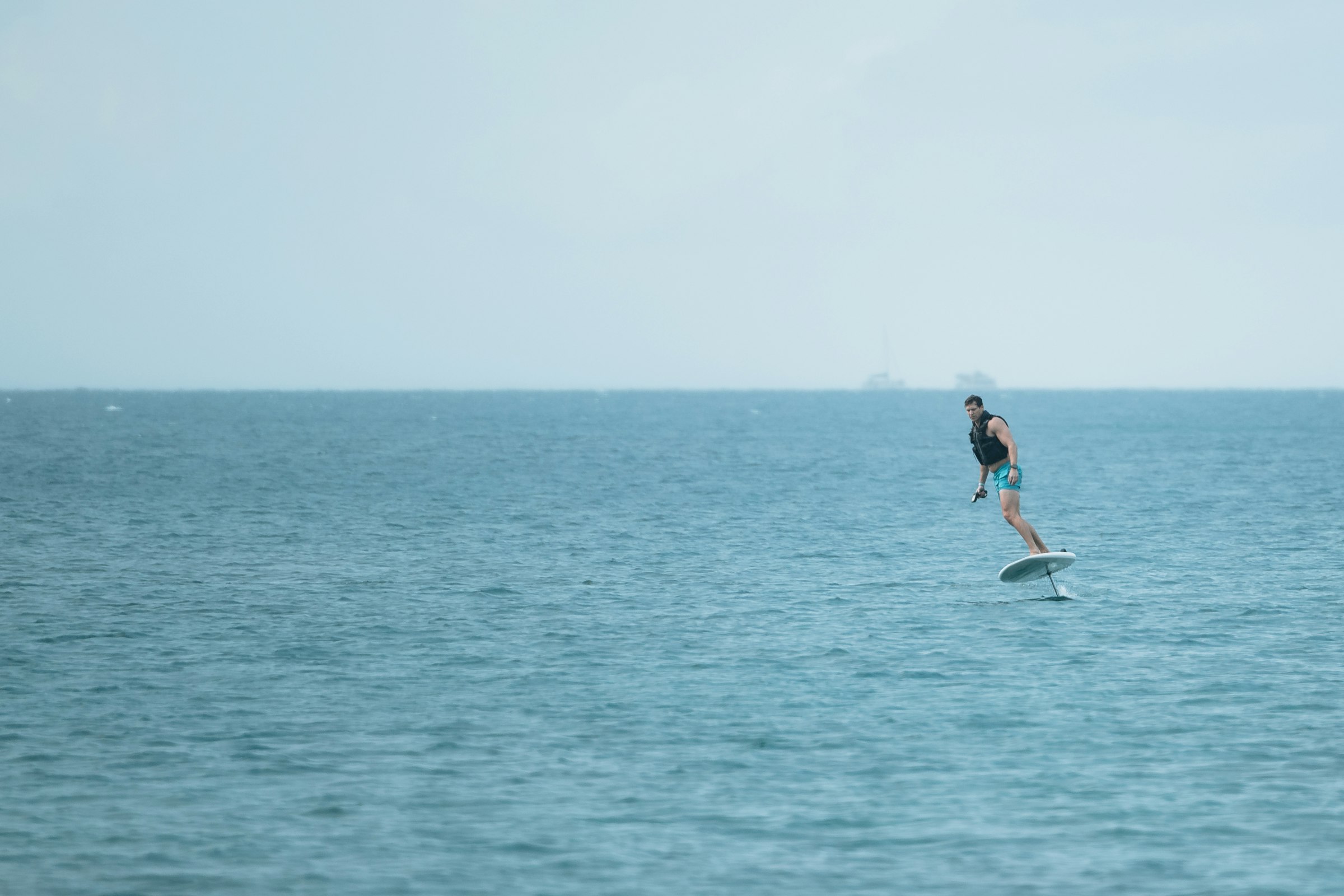 E-foiler flying above open blue water